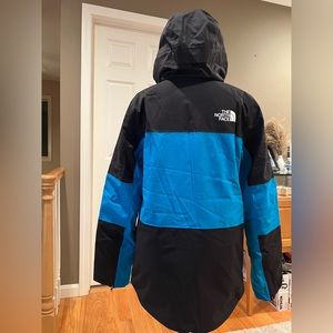 North face Mens Jacket, size S, blue & black stripes, NWT, never worn.